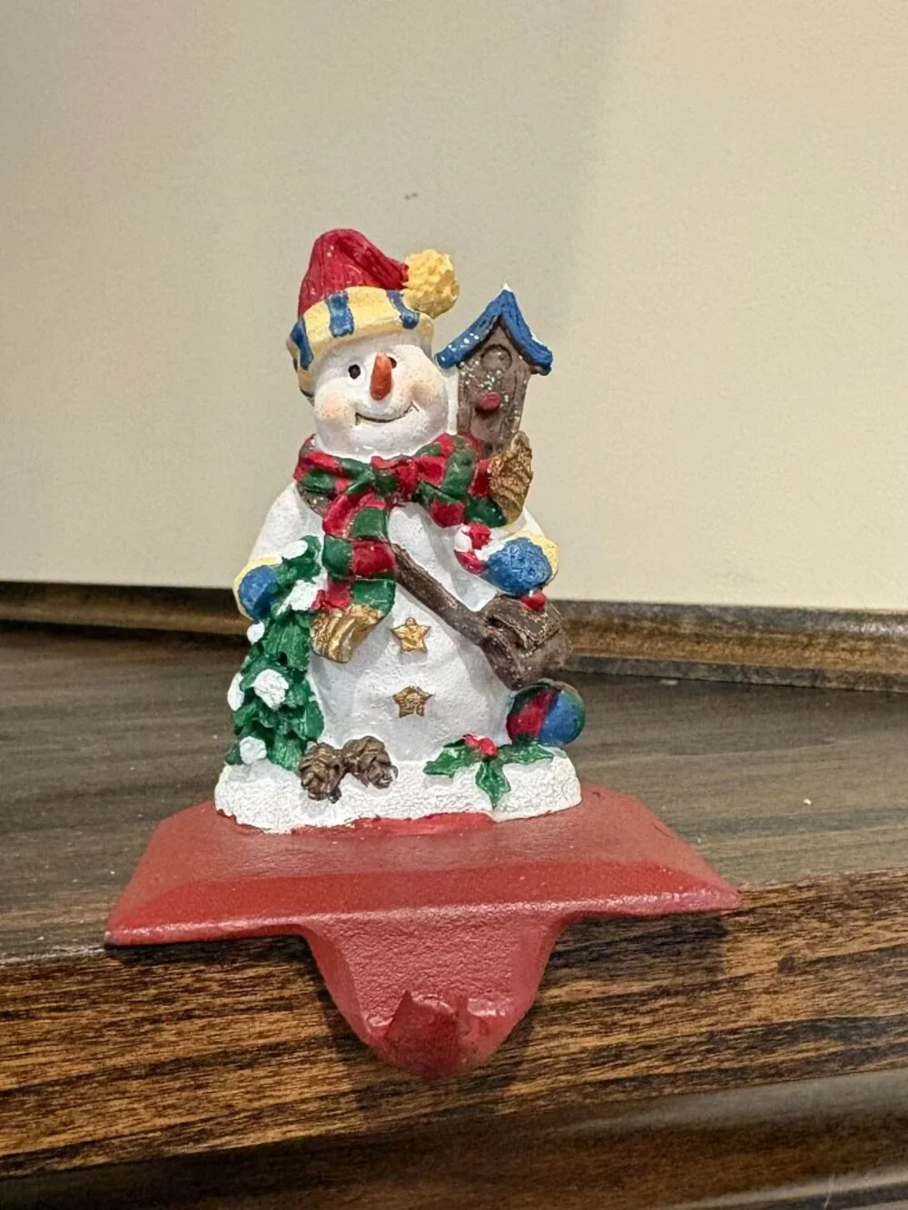 Vintage cast iron stocking holder, snowman with birdhouse, 3.5